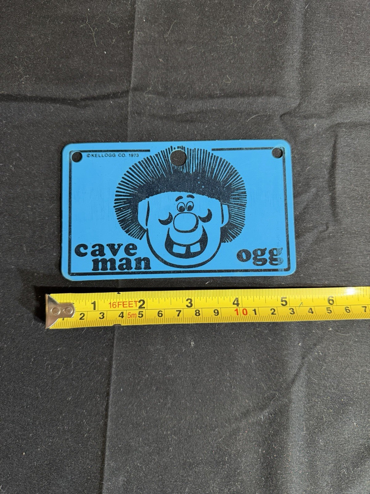 Kelloggs Cave Man Ogg Bicycle License Plate 1973 Bike Toy Premium