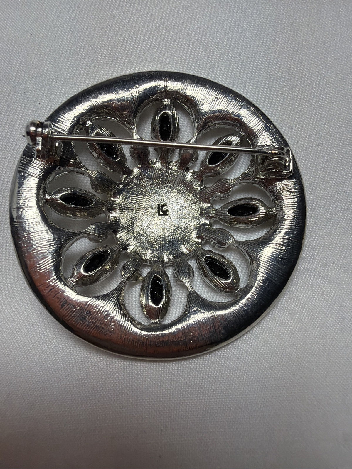 Vintage Brooch LC Black, Clear Gems Silver Tone Round Openwork 1980s Jewelry Pin
