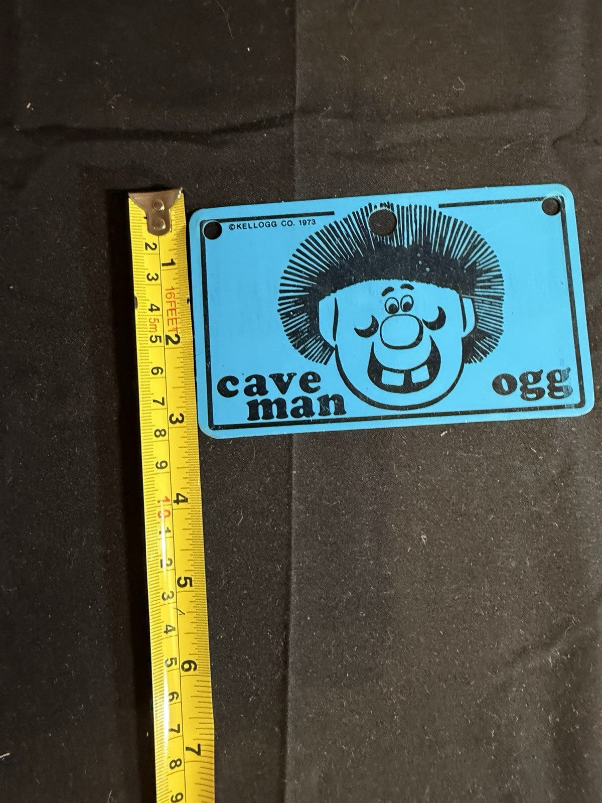 Kelloggs Cave Man Ogg Bicycle License Plate 1973 Bike Toy Premium