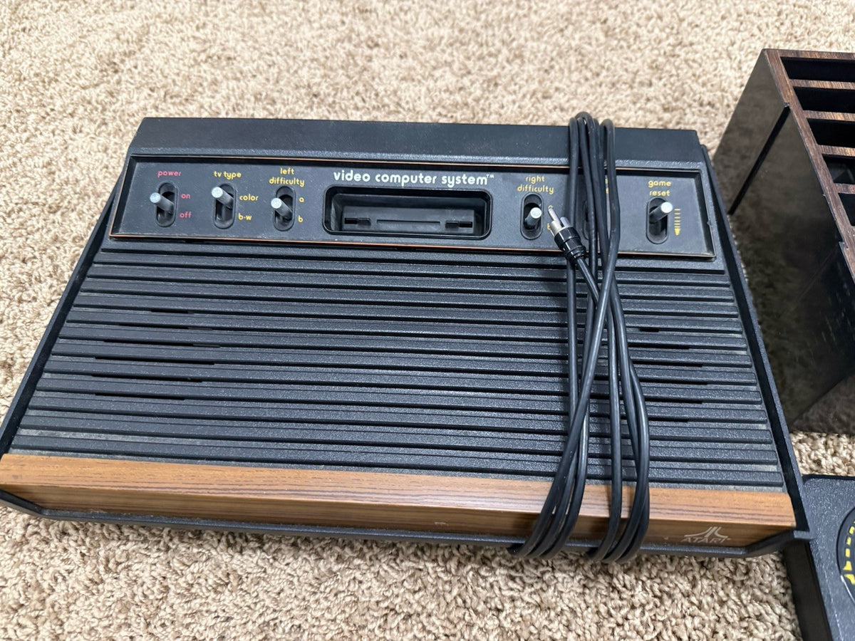 Atari 2600 Woodgrain Console 2 Controllers Paddles Pac Man Combat Games Bundle
